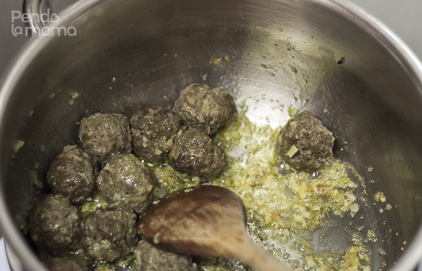 added the heated meatballs to the garlic gave a quick stir to coat them...