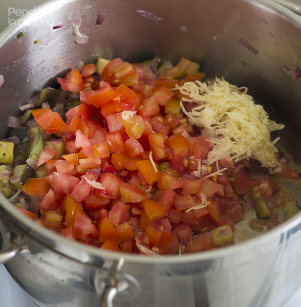 add tomatoes and garlic