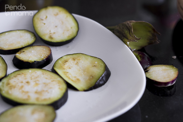 slice a medium sized eggplant, arrange the slices on plate and sprinkle with salt, let them sit for a 10 min before proceeding
