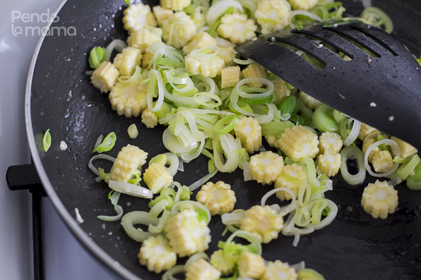 once the butter has melted (or the oil is warmed up enough) add the baby corn